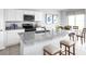 Modern kitchen with stainless steel appliances and granite countertops at 1235 Tank Trl, Haines City, FL 33844