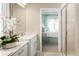 Elegant bathroom features double vanity and a glass-enclosed shower at 117 Eagle Harbor Way, Daytona Beach, FL 32124