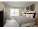 Spacious main bedroom with a king-size bed and plenty of storage at 3022 Ruby Falls Dr, Deland, FL 32724