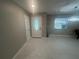 Bright entryway with white door and tile floors at 3062 Rio Ln, Orlando, FL 32805