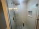 Modern shower with glass enclosure and marble tile at 3062 Rio Ln, Orlando, FL 32805