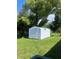 White metal storage shed in backyard at 3062 Rio Ln, Orlando, FL 32805