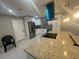 Modern kitchen with island and stainless steel appliances at 3062 Rio Ln, Orlando, FL 32805