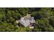 Aerial view of home nestled in lush green landscape at 4920 Sw 78Th Ave, Bushnell, FL 33513