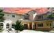 Two story home with covered porch and manicured lawn at 4920 Sw 78Th Ave, Bushnell, FL 33513