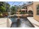 Enclosed pool and spa area with fountain at 4920 Sw 78Th Ave, Bushnell, FL 33513