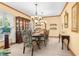 Elegant dining room with a formal table and hutch at 4920 Sw 78Th Ave, Bushnell, FL 33513