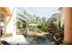 Inviting pool area with a relaxing atmosphere and lush greenery at 4920 Sw 78Th Ave, Bushnell, FL 33513