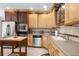 Updated kitchen with stainless steel appliances and ample counter space at 4920 Sw 78Th Ave, Bushnell, FL 33513