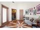 Cozy sitting area with hardwood floors and access to bedroom at 4920 Sw 78Th Ave, Bushnell, FL 33513