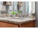 Bathroom vanity with granite countertop and modern faucet at 2541 Yellow Brick Rd, Saint Cloud, FL 34772