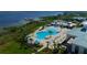 Aerial view of resort-style pool with expansive deck and lounge chairs at 2541 Yellow Brick Rd, Saint Cloud, FL 34772
