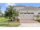 Attached garage with brick driveway, offering convenient parking at 2541 Yellow Brick Rd, Saint Cloud, FL 34772