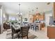 Open concept dining area with kitchen and living room views at 2541 Yellow Brick Rd, Saint Cloud, FL 34772