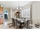 Bright dining room features a table and chairs for six at 2541 Yellow Brick Rd, Saint Cloud, FL 34772