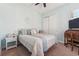 Cozy bedroom with double bed, desk, and TV at 2541 Yellow Brick Rd, Saint Cloud, FL 34772