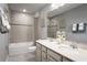 Double vanity bathroom with bathtub and shower at 5706 Freshwater Canyon Dr, St Cloud, FL 34771