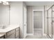 Bathroom with single vanity, walk-in shower, and closet at 5706 Freshwater Canyon Dr, Saint Cloud, FL 34771