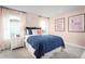 Charming bedroom with a polka dot bedspread and decorative art at 5706 Freshwater Canyon Dr, St Cloud, FL 34771
