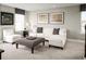 Relaxing Gathering room with sectional sofa and ottoman at 5706 Freshwater Canyon Dr, Saint Cloud, FL 34771