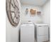 Convenient laundry room with washer, dryer, and shelving at 360 Crossings Ave, St Cloud, FL 34771
