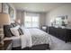 Spacious main bedroom with large windows and plenty of natural light at 5769 Anders Way, St Cloud, FL 34771
