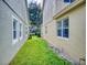 Long side yard with grass, providing ample space at 107 Littleton Cir, Deland, FL 32724