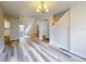 Bright dining room with hardwood floors and chandelier at 107 Littleton Cir, Deland, FL 32724