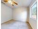 Bedroom with window, ceiling fan and closet at 107 Littleton Cir, Deland, FL 32724