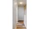 Simple hallway with light walls and flooring at 107 Littleton Cir, Deland, FL 32724