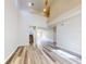 Open concept living room with hardwood floors and high ceilings at 107 Littleton Cir, Deland, FL 32724