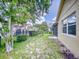 Landscaped backyard with privacy fence and trees at 107 Littleton Cir, Deland, FL 32724
