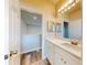 Bathroom with white cabinets and quartz countertop at 107 Littleton Cir, Deland, FL 32724