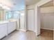 Main bathroom with double vanity and walk-in shower at 107 Littleton Cir, Deland, FL 32724