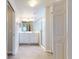 Double vanity bathroom with walk-in shower and tile floor at 107 Littleton Cir, Deland, FL 32724