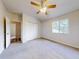Spacious bedroom with ceiling fan and window at 107 Littleton Cir, Deland, FL 32724