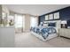 Spacious main bedroom with a large bed and dresser at 5102 Grand Teton Ct, Deland, FL 32724