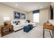 Relaxing living room with sectional sofa and ottomans at 5102 Grand Teton Ct, Deland, FL 32724
