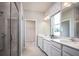 Bathroom with double vanity and large walk-in shower at 814 Canyon Creek Dr, New Smyrna Beach, FL 32168