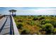 Boardwalk path leading to a beach overlook at 814 Canyon Creek Dr, New Smyrna Beach, FL 32168