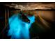 Boat glowing blue in bioluminescent water at night at 814 Canyon Creek Dr, New Smyrna Beach, FL 32168