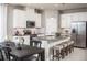 Modern kitchen with stainless steel appliances and an island at 814 Canyon Creek Dr, New Smyrna Beach, FL 32168