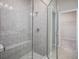 Large walk-in shower with built-in seat at 1897 Basenji Dr, Lake Alfred, FL 33850
