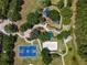 Overhead view of a community park with basketball and volleyball courts at 6923 Five Oaks Dr, St Cloud, FL 34773