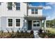 Two-story house with gray and white exterior at 6923 Five Oaks Dr, St Cloud, FL 34773