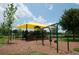 Playground with swings and shade structure at 6923 Five Oaks Dr, St Cloud, FL 34773