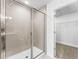 Bathroom with a large shower and walk-in closet at 6923 Five Oaks Dr, St Cloud, FL 34773