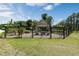 Fenced community garden with gazebo and picnic tables at 6923 Five Oaks Dr, St Cloud, FL 34773