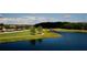 Community park with a scenic walking path along a calm lake at 6923 Five Oaks Dr, St Cloud, FL 34773