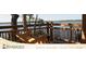 Wooden swing on a lakeside pavilion at 6923 Five Oaks Dr, St Cloud, FL 34773